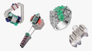 Left to right: Cartier Libre watch in 18-karat white gold with rubies, sapphires, emeralds, chrysoprase, lapis lazuli, black spinels, turquoise, and diamonds; Cartier Libre brooch watch in 18-karat white gold with rubies, emeralds, chrysoprase, coral, onyx, black spinels, and diamonds; Cartier Libre TuttiTutti ring in 18-karat white gold set with chrysoprase, emeralds, and diamonds; Cartier Libre brooch watch in 18-karat white gold with moonstones and diamonds