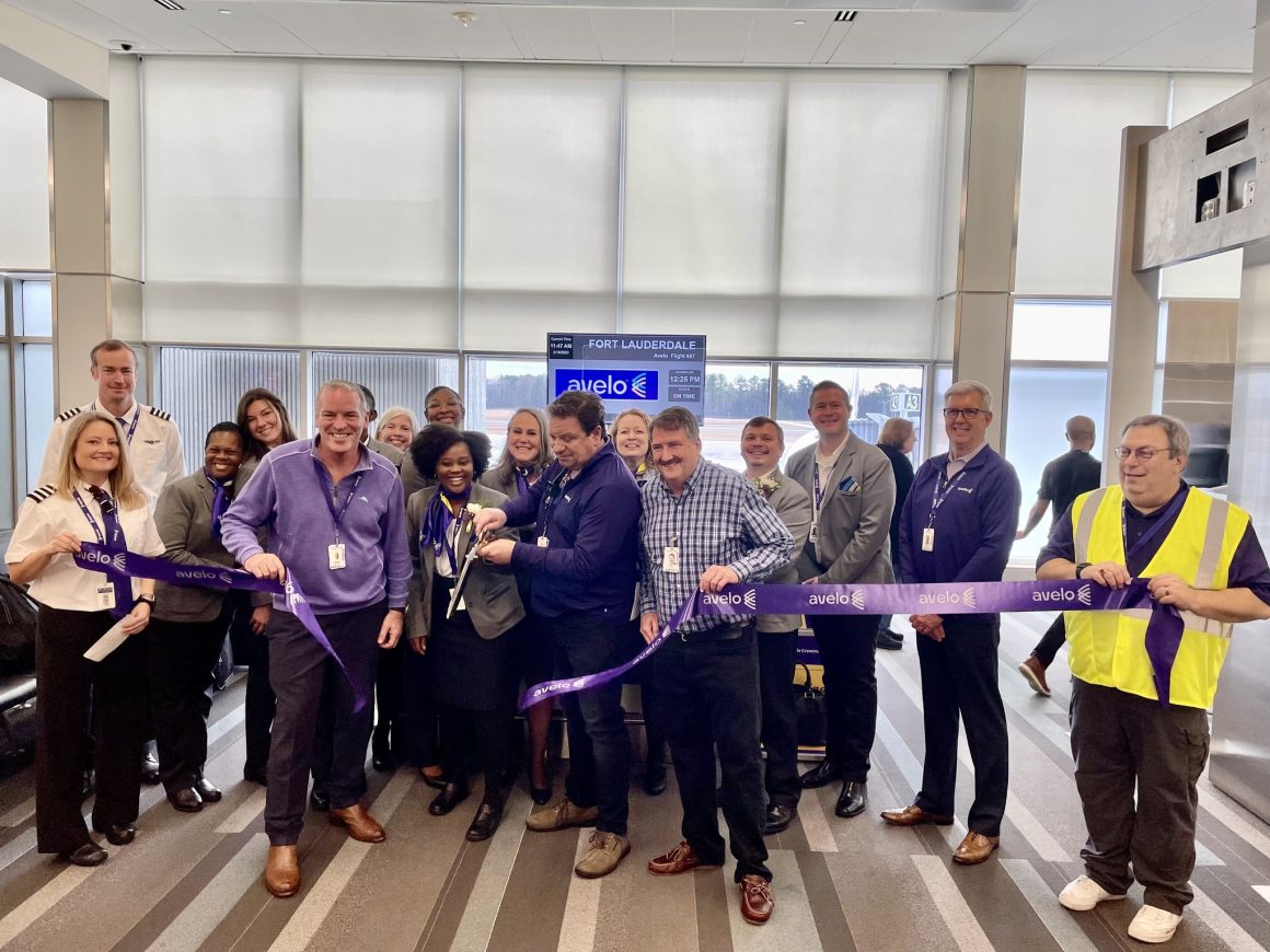 Avelo COO Greg Baden helps cut the ribbon at RDU