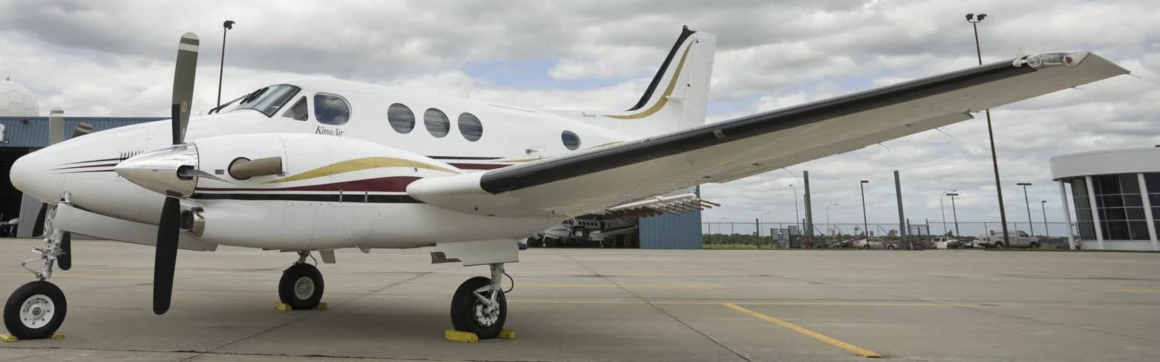 Beechcraft King Air with flare racks on trailing edge of wing. | Image: Weather Modification International