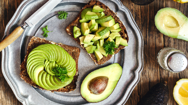 Toast topped with elegantly cut avocado