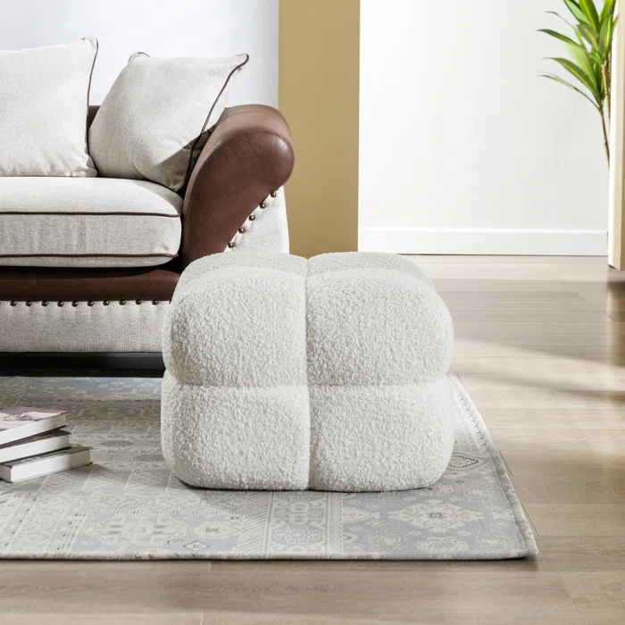 plush sherpa ottoman on rug