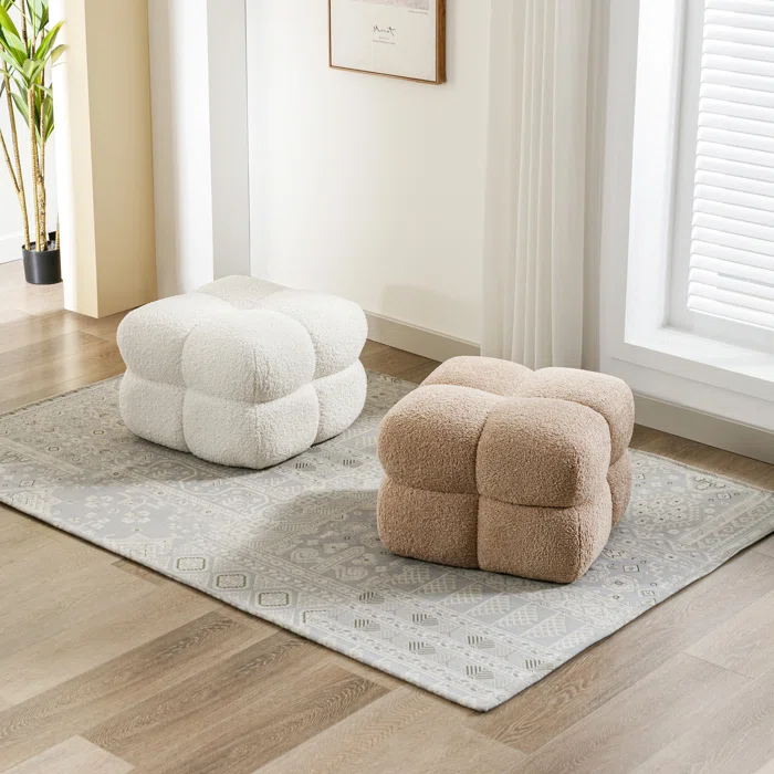 sherpa ottomans in beige and white