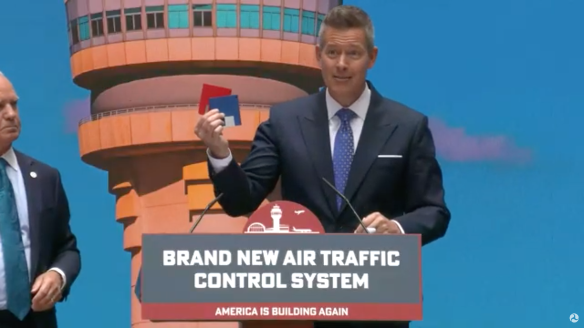 US Department of Transportation Secretary Sean P. Duffy holds up floppy disks