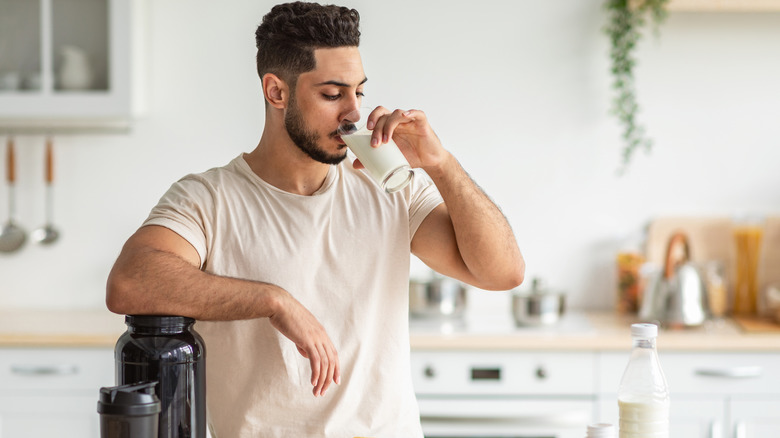 A fit man drinking a protein shake