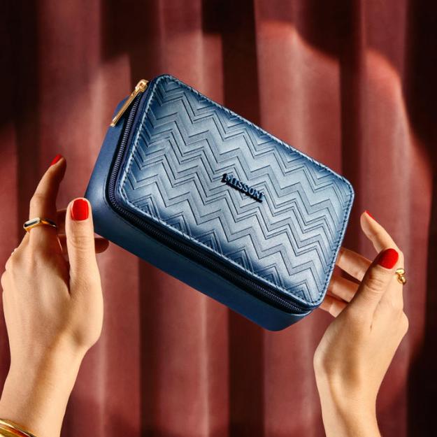 Delta and Missoni – a brand known for its creative use of colors and patterns – have elevated Delta One with a new customer amenity kit, which features Missoni's signature textured zigzag pattern on the exterior of the bag.