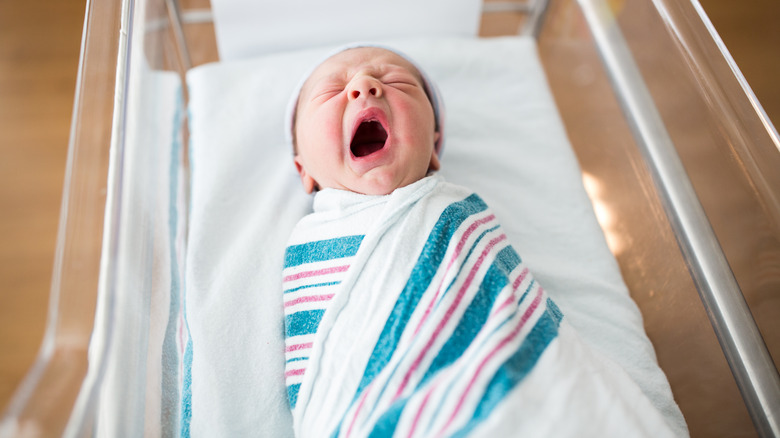 yawing infant in hospital nursery